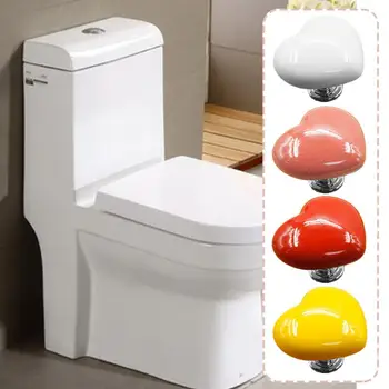 Цветни пластмасови резервоара за тоалетната чиния във формата на сърце, второстепенен бутон, залепваща пластмасова дръжка, преносим аксесоар, дръжка за клип на тоалетни